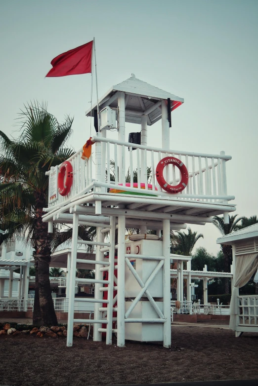 a lifeguard tower sitting on top of a sandy beach, hurufiyya, water park, very elegant & complex, tree house, in 2 0 1 5