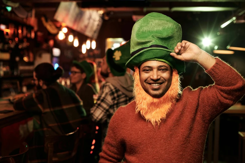 a man with a beard and a green hat, happening, revellers, smiling, iconic scene, mighty nein