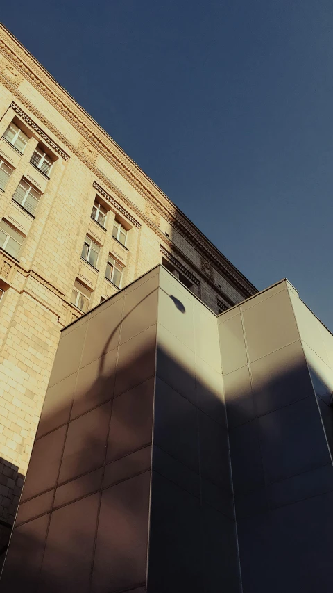 a man flying through the air while riding a skateboard, inspired by Paul Lucien Dessau, unsplash, photorealism, james turrell building, soft morning light. hyperrealism, soviet architecture, street corner