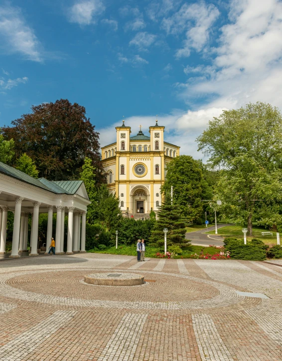 a clock tower sitting in the middle of a park, a picture, by Jan Henryk Rosen, pexels contest winner, art nouveau, holy place, villany, thumbnail, panoramic shot