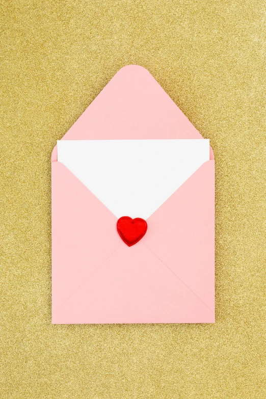 a pink envelope with a red heart on it, by Elaine Hamilton, pexels contest winner, pink and gold, instagram picture, pastel colors only, greeting card