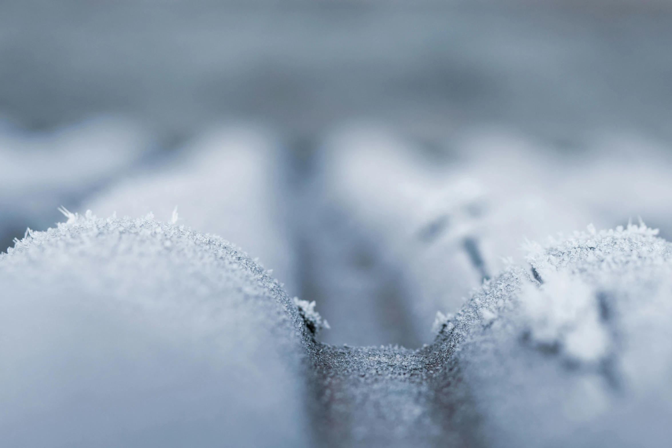 a close up of a snow covered bench, a macro photograph, pexels contest winner, roof background, grey, background image, mechanical