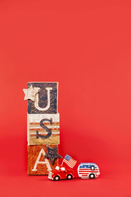 wooden blocks spelling the word usa on a red background, by Alison Geissler, american realism, hero shot, parade floats, k, profile image