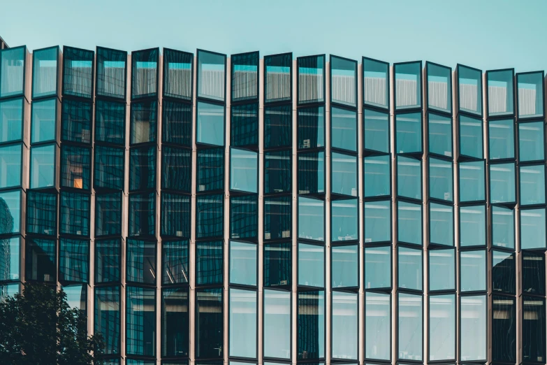 a tall glass building with a clock tower in the background, by Emma Andijewska, pexels contest winner, modernism, cyan shutters on windows, square lines, glass and metal : : peugot onyx, desktop wallpaper