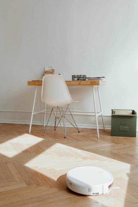 a room that has a vacuum on the floor, pexels contest winner, light and space, minimalist desk, 15081959 21121991 01012000 4k, small chest, natural wood top