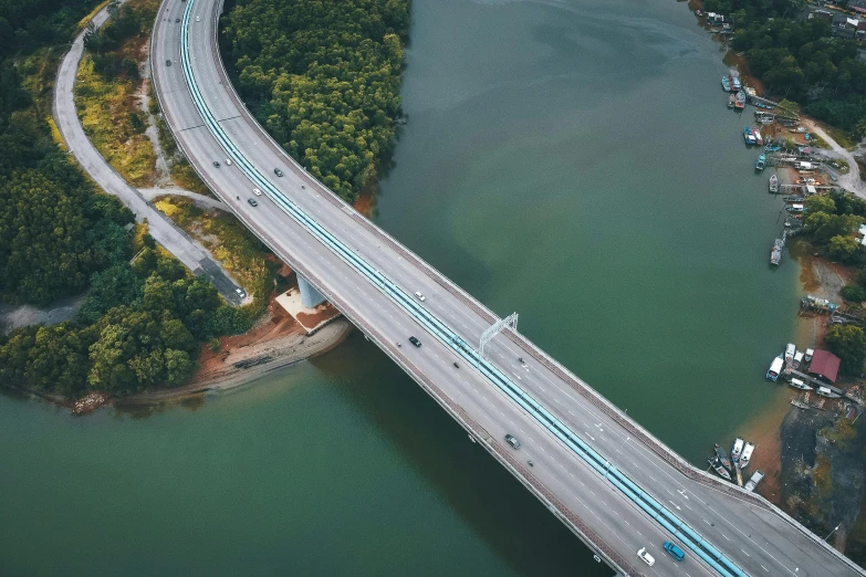 an aerial view of a bridge over a river, pexels contest winner, hurufiyya, advanced highway, singapore, thumbnail, hyperdetailed!