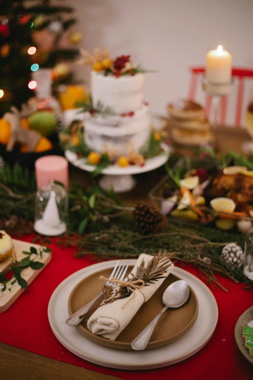 a table topped with plates of food next to a christmas tree, wedding, shot with premium dslr camera, fruit, harvest