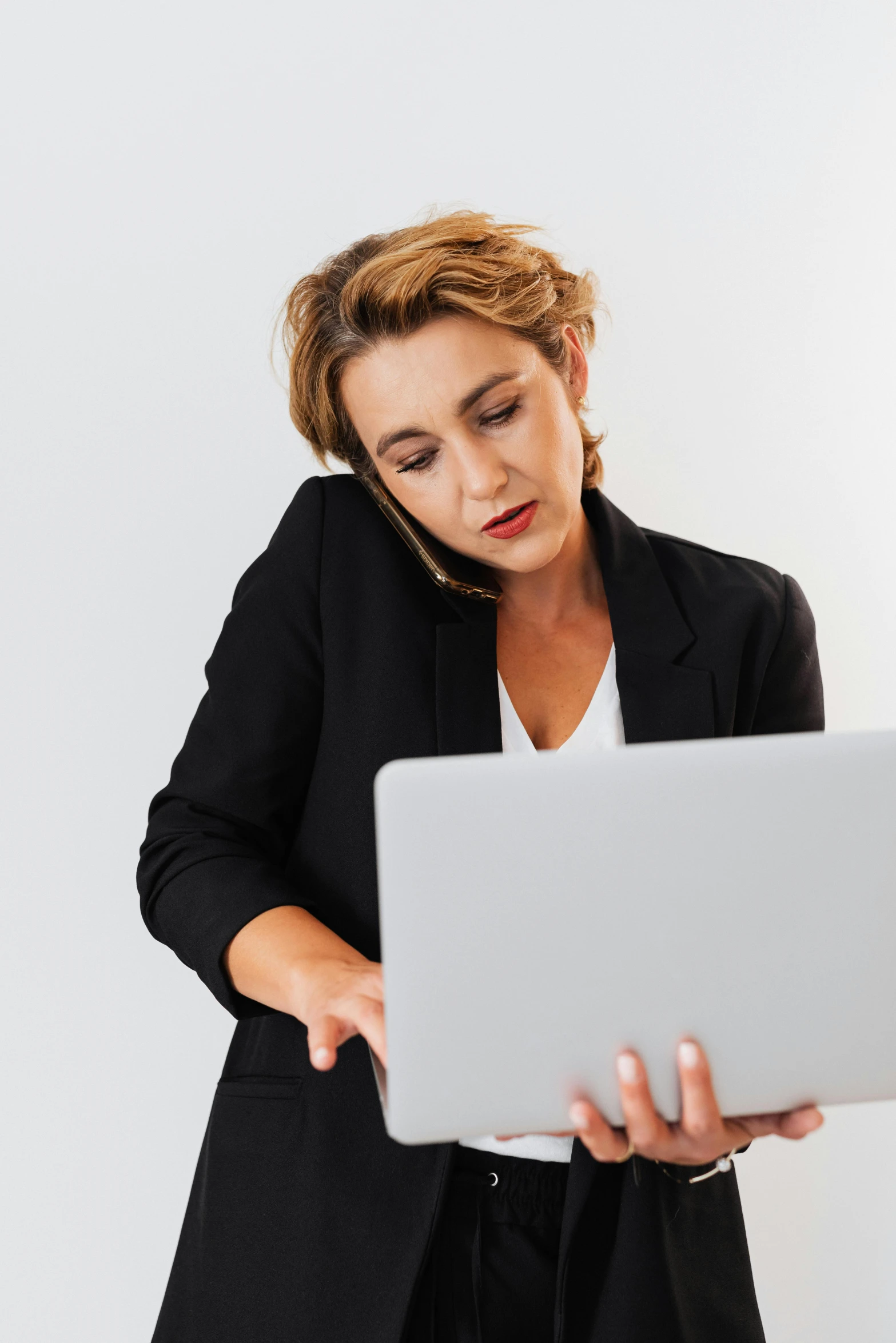 a woman in a business suit looking at a laptop, looking confused, instagram post, maintenance, profile image