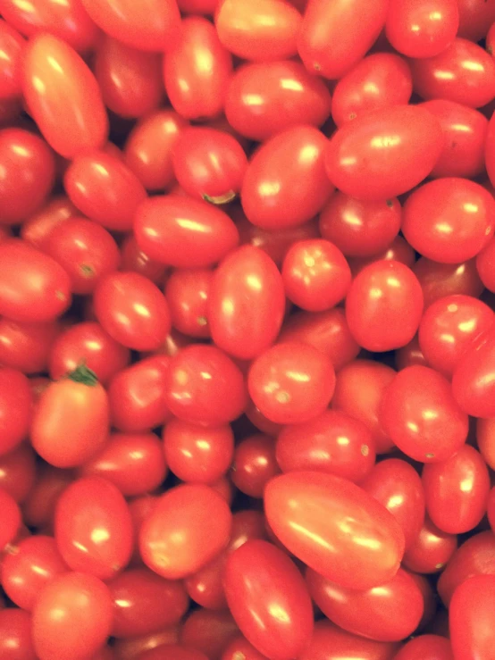 a pile of tomatoes sitting on top of each other, by Thomas Barker, reddit, jellybeans, 2 5 6 x 2 5 6 pixels, sea of parfait, metallic red