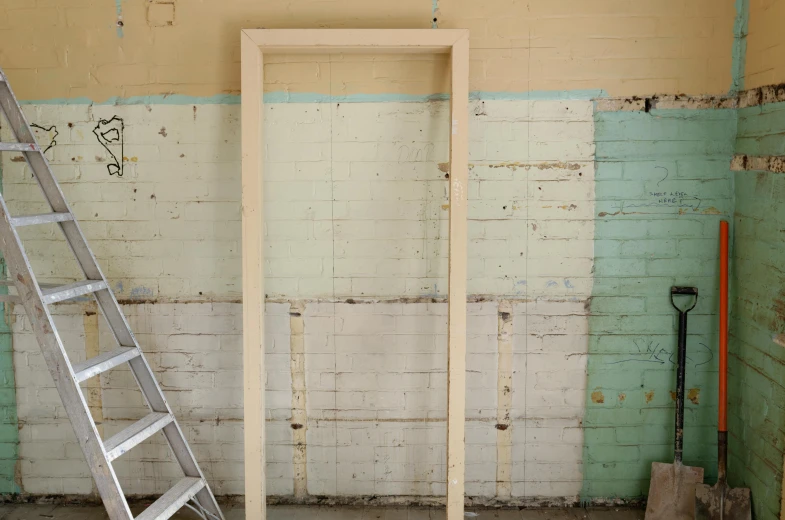 a ladder leaning against a wall in a room, an album cover, inspired by Rachel Whiteread, unsplash, temporary art, construction site, wood door, 15081959 21121991 01012000 4k, full height