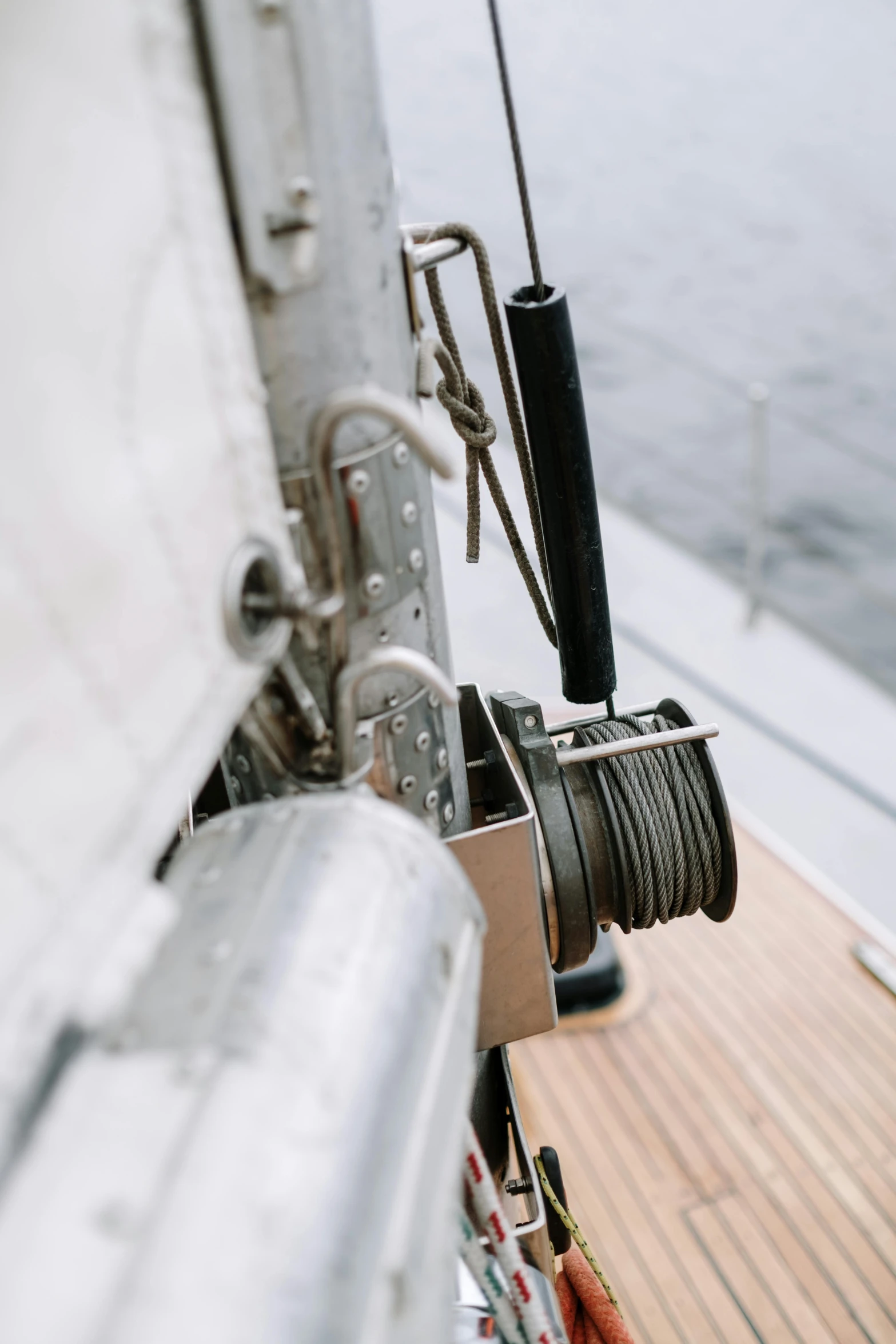 a close up of a boat on a body of water, levers, a 35mm photo, square jaw-line, high-quality photo