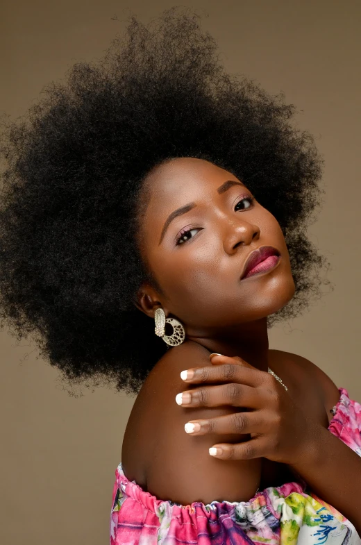 a woman with an afro is posing for a picture, an album cover, by Chinwe Chukwuogo-Roy, pexels contest winner, black elegant hair, shiny skin, pastel', without background