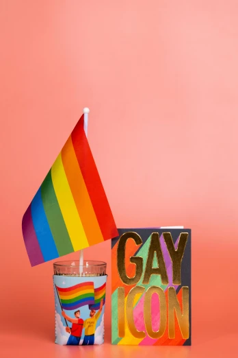 a candle with a rainbow flag next to it, a polaroid photo, pop art, welcoming, goop, two male, can