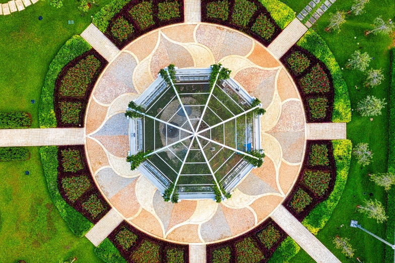 a bird's eye view of a circular garden, a mosaic, pexels contest winner, dome of wonders, yantra, panoramic photography, hexagonal