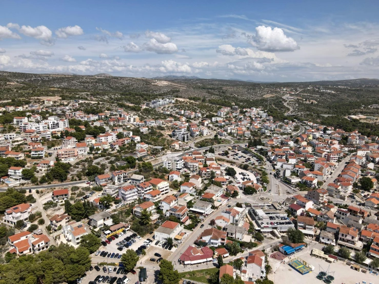 a bird's eye view of a small town, a portrait, pexels contest winner, photorealism, cyprus, ultra wide angle isometric view, square, panorama