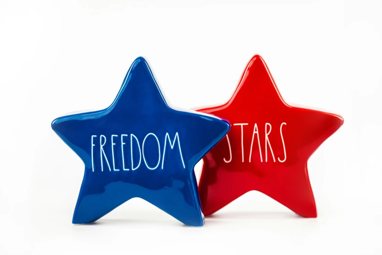 two red and blue stars with the word freedom written on them, inspired by Louise Bourgeois, pexels, ceramics, porcelain holly herndon statue, on white background, official product photo