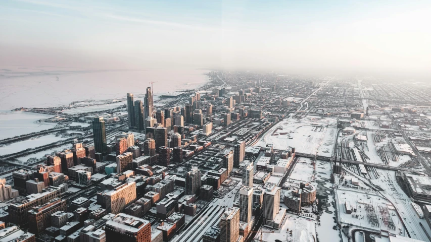 an aerial view of a city covered in snow, pexels contest winner, chicago, background image, instagram photo, high resolution photo