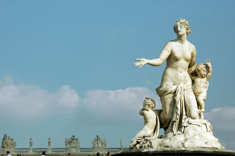 a statue that is sitting on top of a fountain, by Gian Lorenzo Bernini, pexels contest winner, neoclassicism, venus, blue sky, garniture, thumbnail