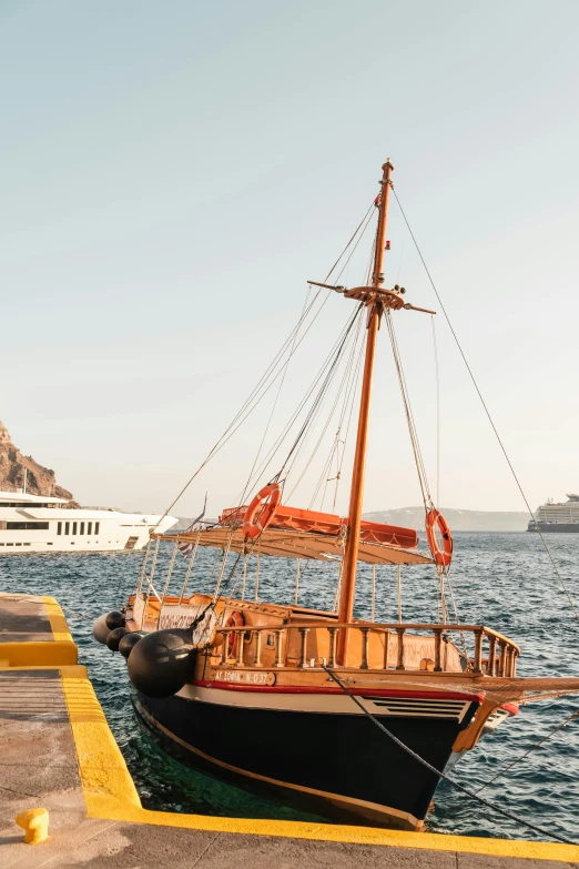 a boat that is sitting in the water, santorini, docked at harbor, wooden platforms, ameera al taweel