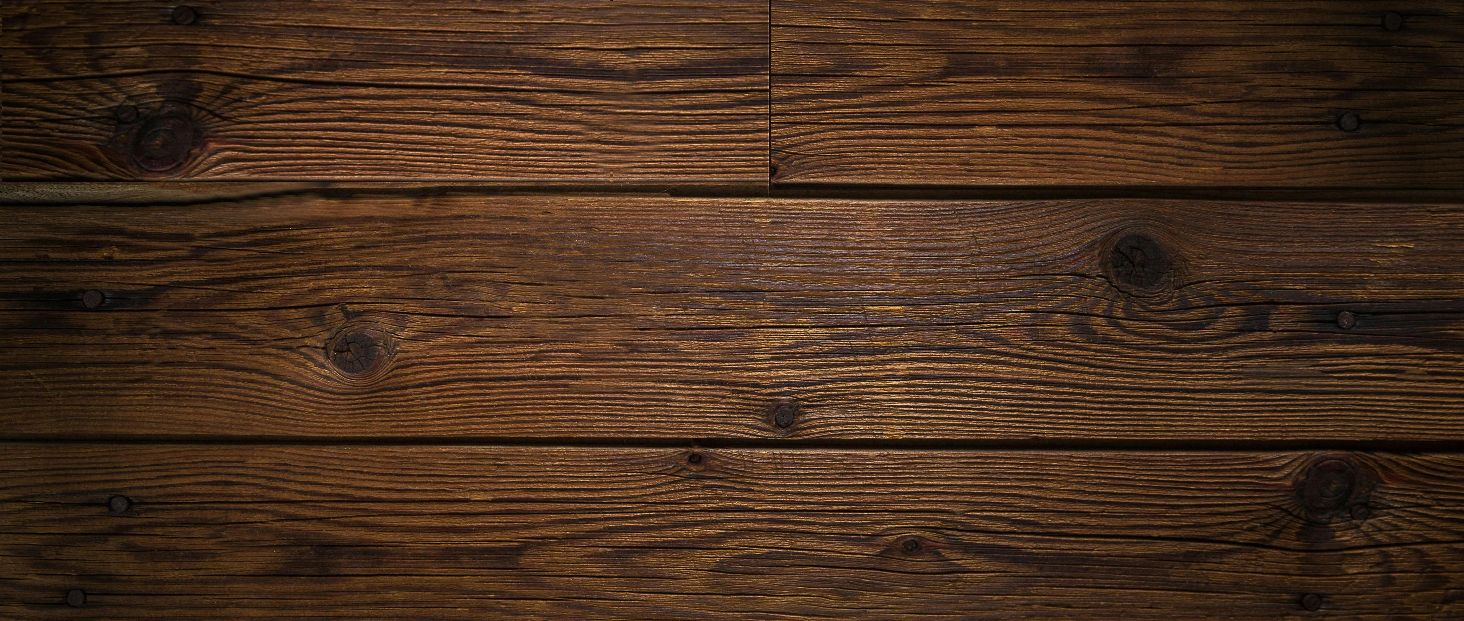 a close up view of a wooden wall