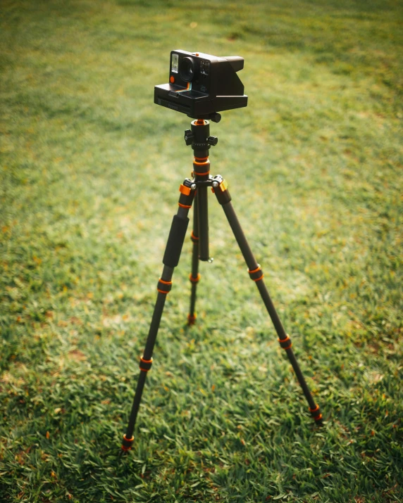 a camera sitting on top of a tripod in a field, unsplash, video art, ultra realistic 8k octa photo, rotoscope, lightroom preset, camera glare in oil style