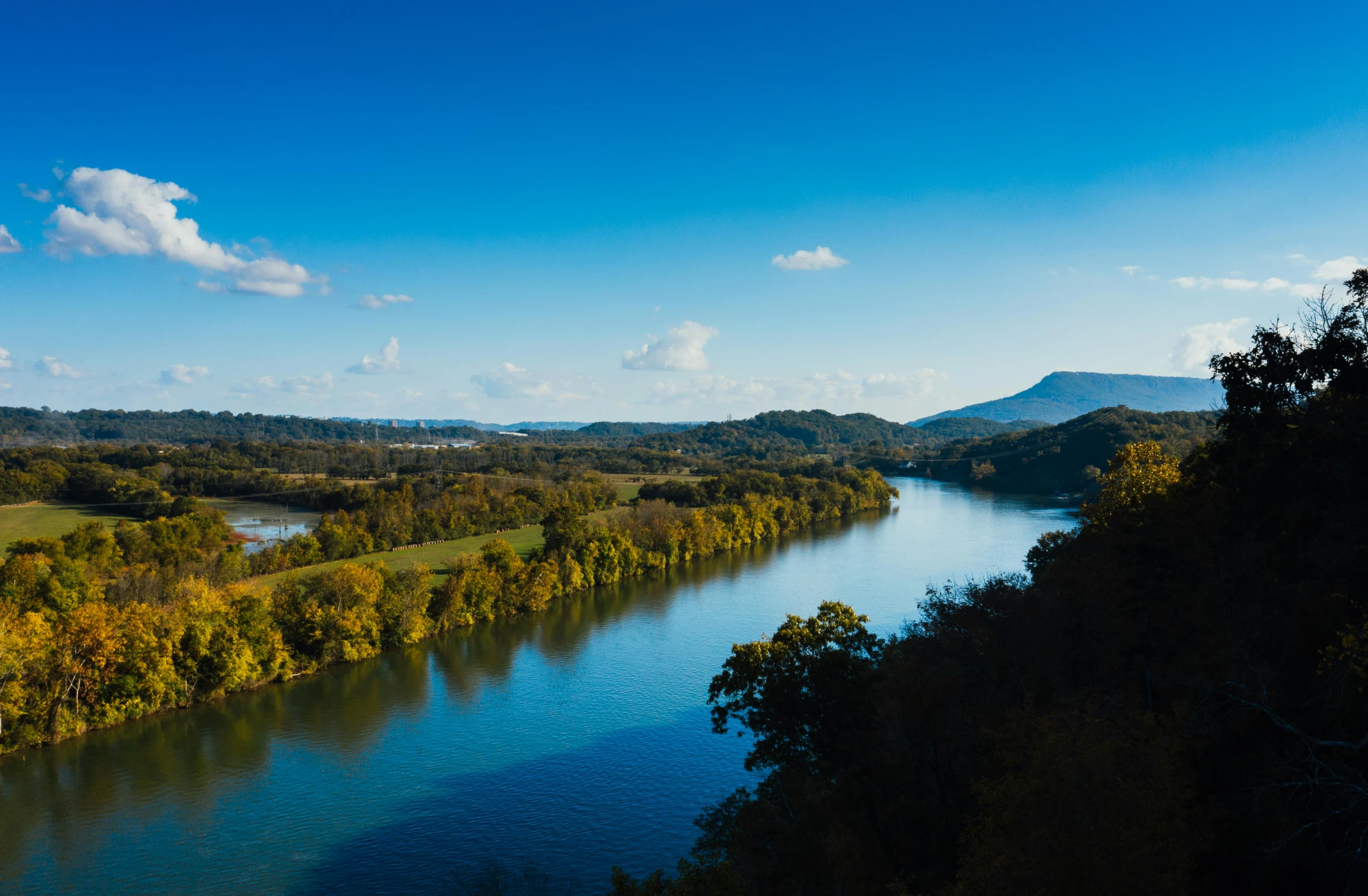 a large body of water surrounded by trees, tn, mountains and rivers, fan favorite, wide angle river