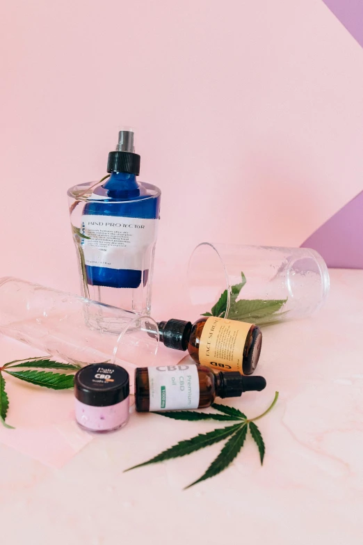 a couple of bottles sitting on top of a table, product image, marijuana asymmetrical, clear makeup, well list