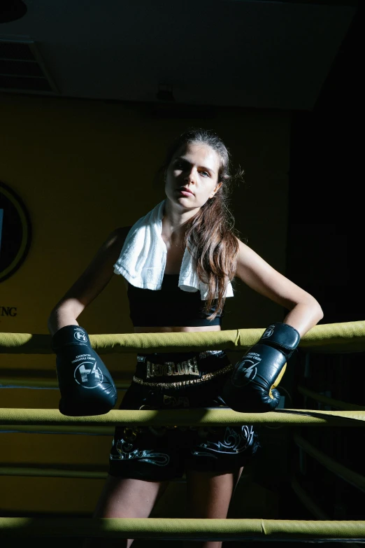 a woman in a boxing ring posing for a picture, a portrait, inspired by Louisa Matthíasdóttir, flickr, portrait sophie mudd, serious business, chun li at the gym, glamour shot