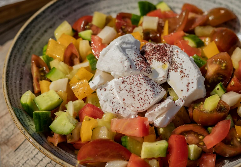 a close up of a bowl of food on a table, braavos, salad, detailed product image, hosada