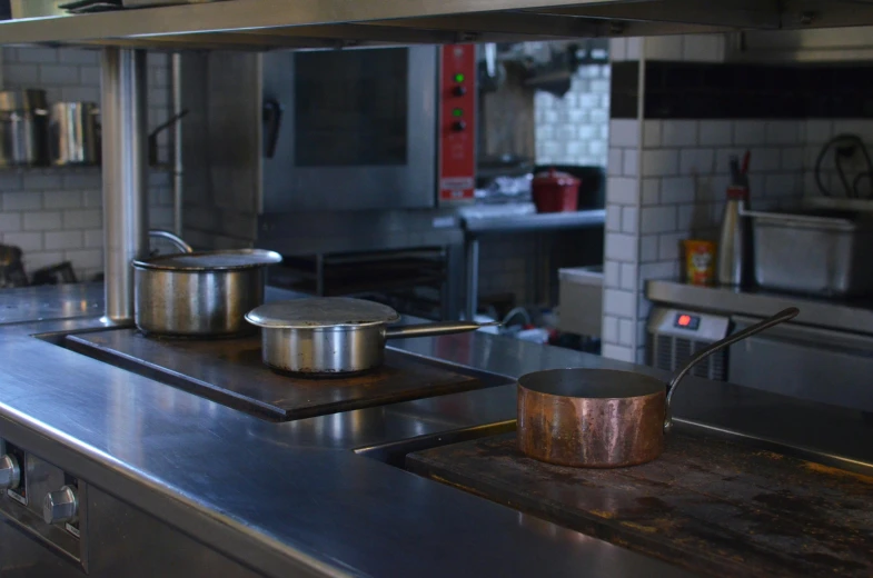 a kitchen with pots and pans on the stove, les nabis, hot food, refined, thumbnail