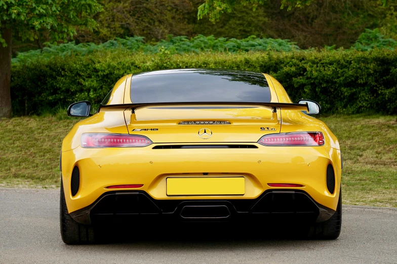 the rear end of a yellow sports car, pexels contest winner, mercedes, extra high resolution, rectangle, f12