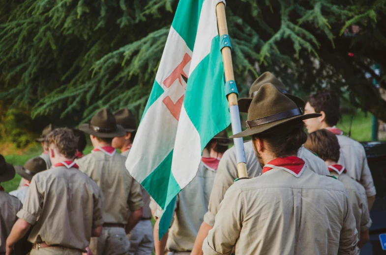 a group of scouts standing next to each other, unsplash, renaissance, green flags, wes anderson background, profile image, australia