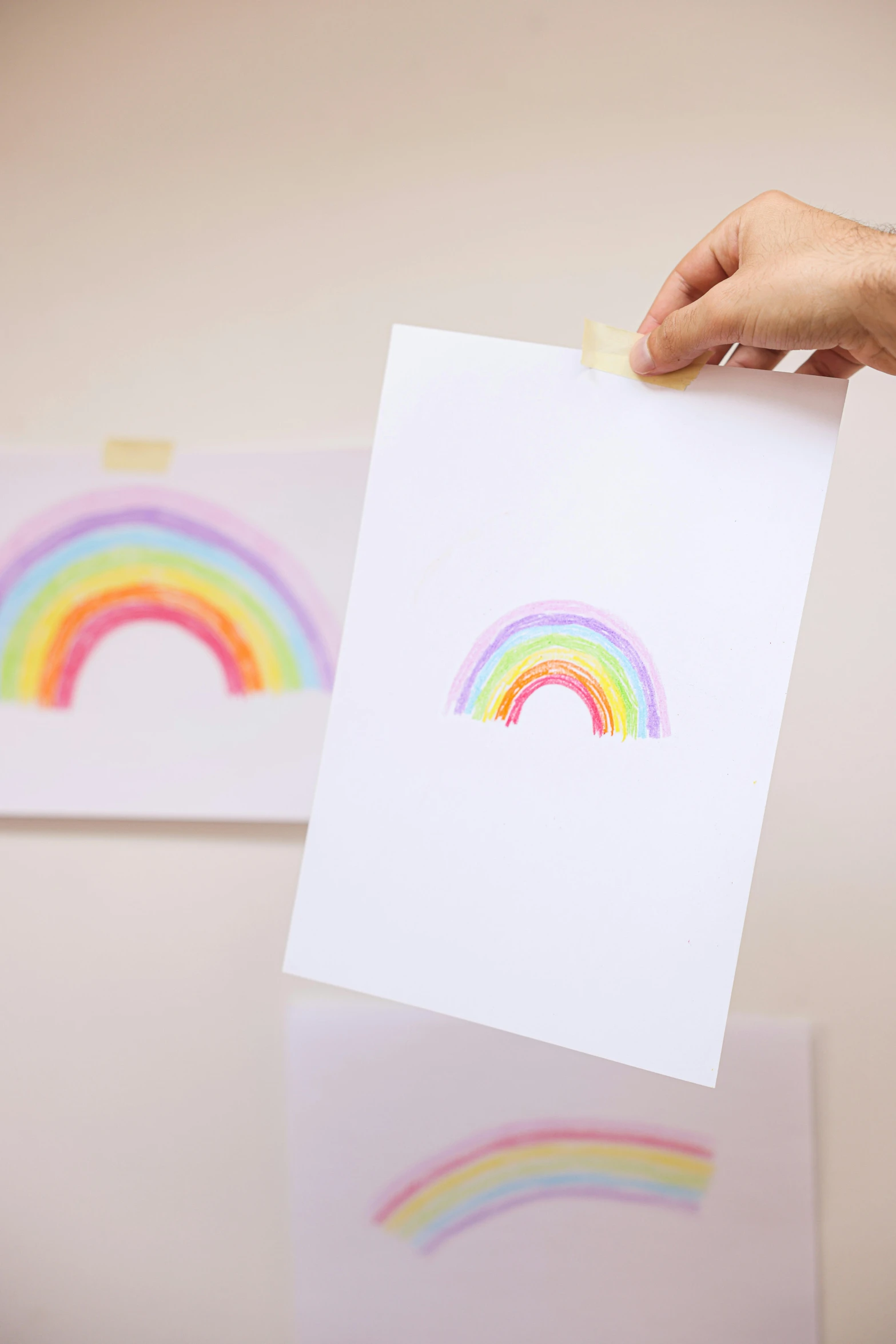 a person holding a piece of paper with a rainbow drawn on it, crayon art, glitter sticker, product introduction photo, large pastel, large portrait