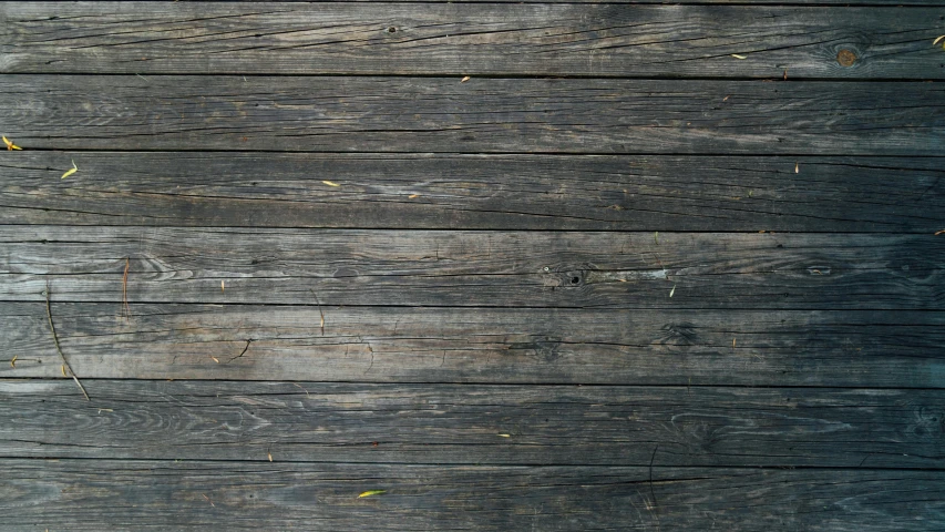 a fire hydrant sitting on top of a wooden floor, an album cover, pexels contest winner, minimalism, black vertical slatted timber, dark grey, seamless wood texture, background image