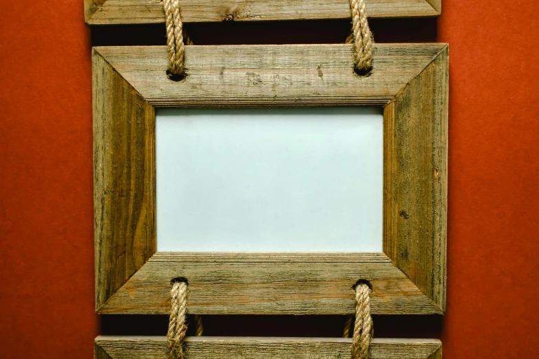 a picture frame hanging on a wall with rope, 15081959 21121991 01012000 4k, wooden boat, taken in the 2000s, square
