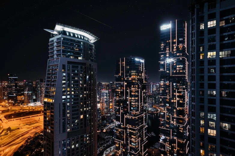 a view of a city at night from a high rise building, dubai, unsplash photo contest winner, hyperdetailed illustration, tall minimalist skyscrapers
