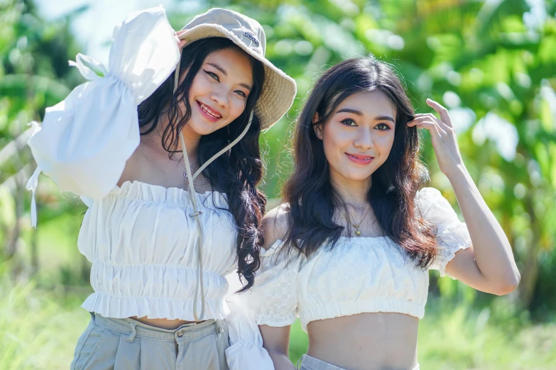 a couple of women standing next to each other, an album cover, inspired by Wang Duo, unsplash, crop top, anime thai girl, 15081959 21121991 01012000 4k, beauty