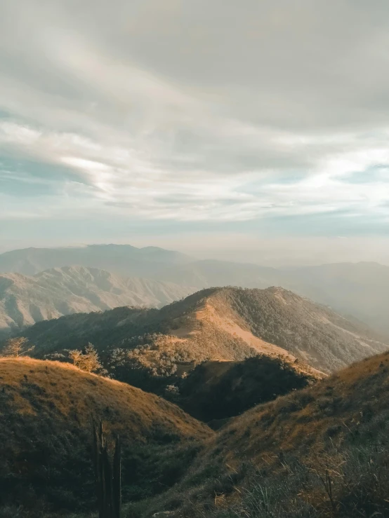 a view of the mountains from the top of a hill, pexels contest winner, sumatraism, malibu canyon, wide high angle view, atmospheric feeling, background image