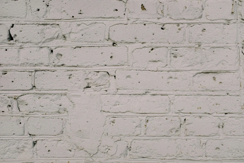 a fire hydrant in front of a white brick wall, inspired by Rachel Whiteread, unsplash, detail texture, moonlight grey, background image, robert maplethorpe