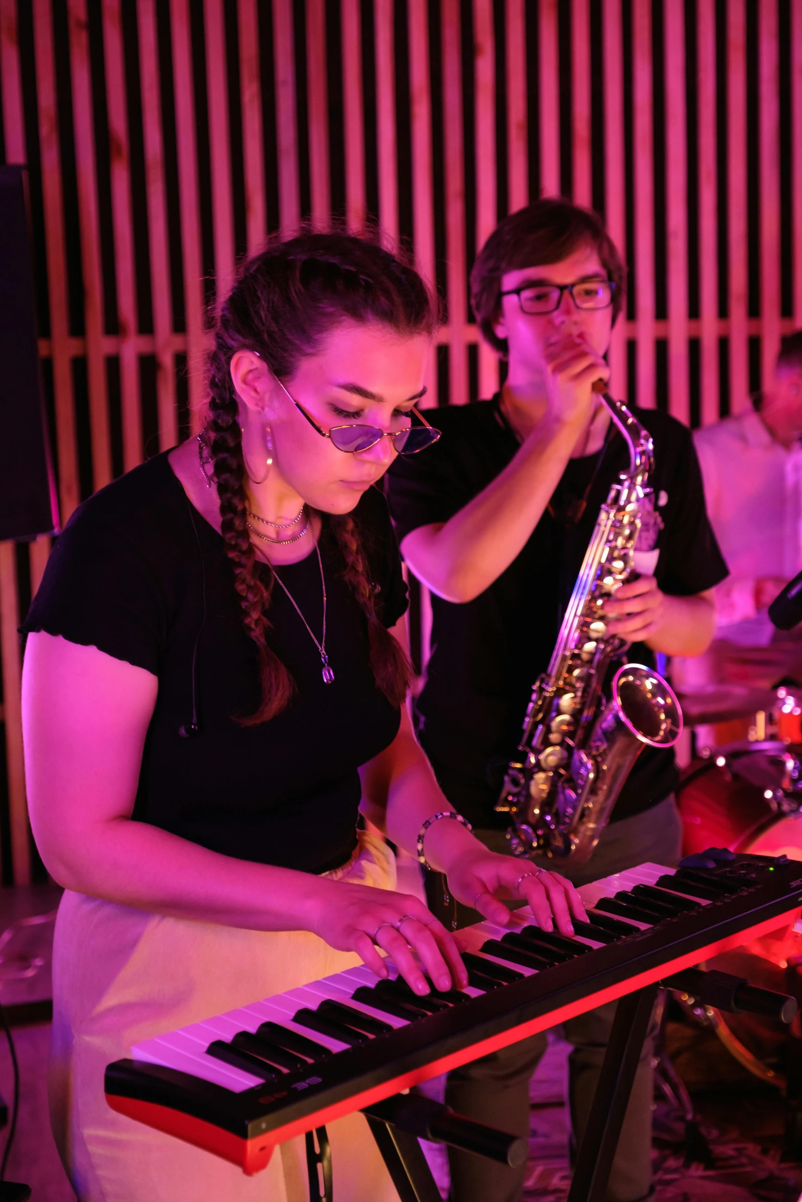 a group of people playing musical instruments in a room, profile image, charli bowater and artgeem, saxophone, keyboardist