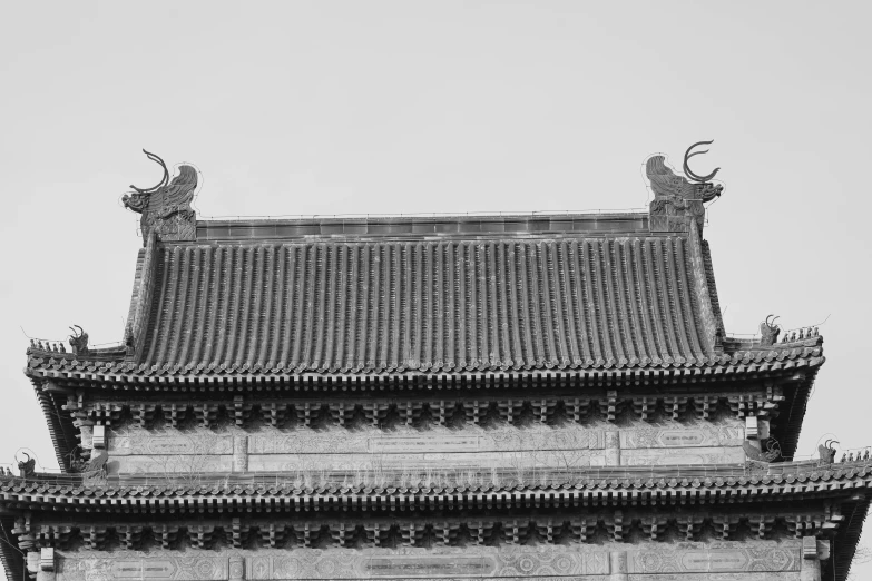 a black and white photo of a clock tower, inspired by Wang Yi, pexels contest winner, minimalism, two large horns on the head, tang dynasty palace, stone roof, beijing