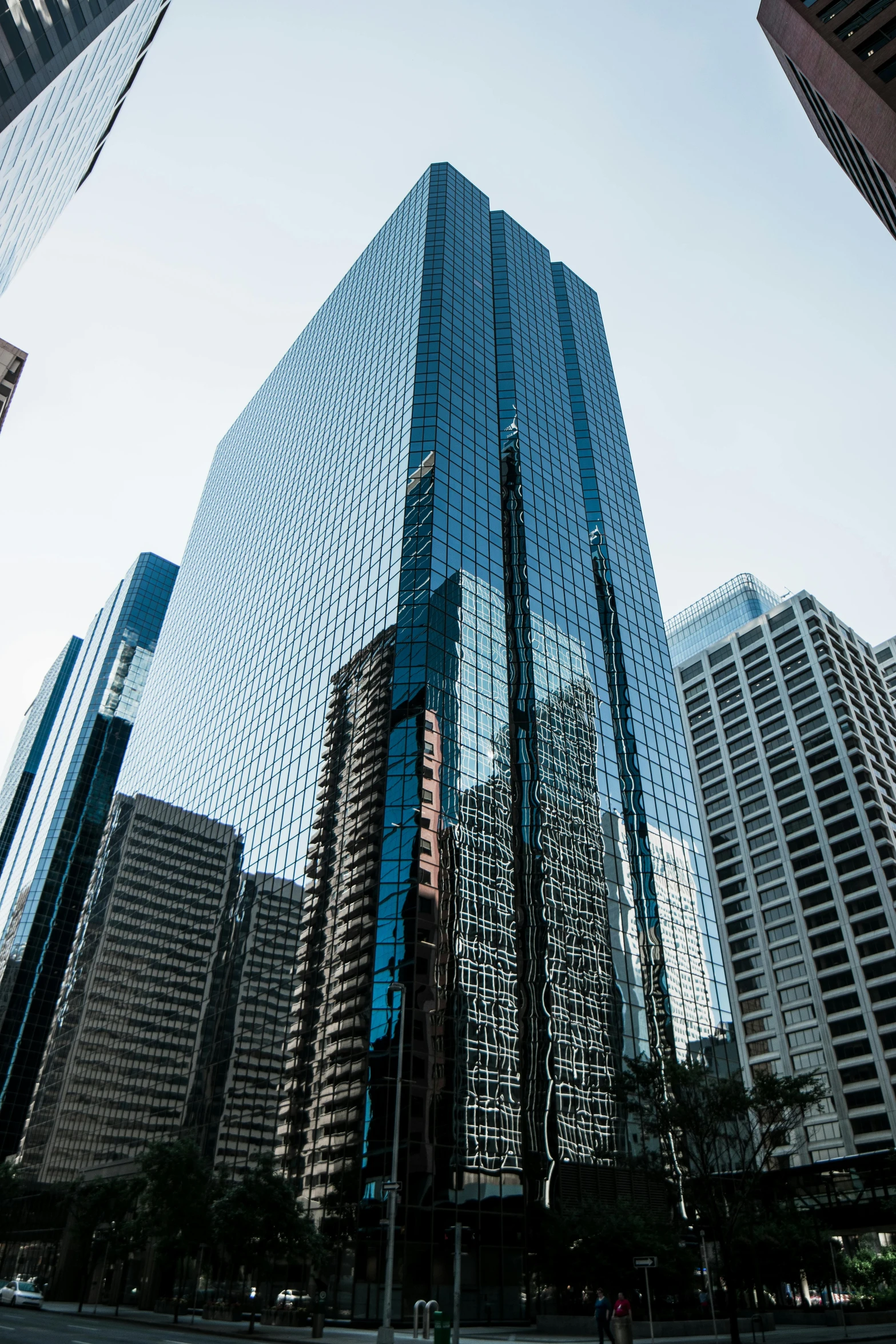 a very tall building sitting in the middle of a city, modern chicago streets, trump, f/1.8, asia