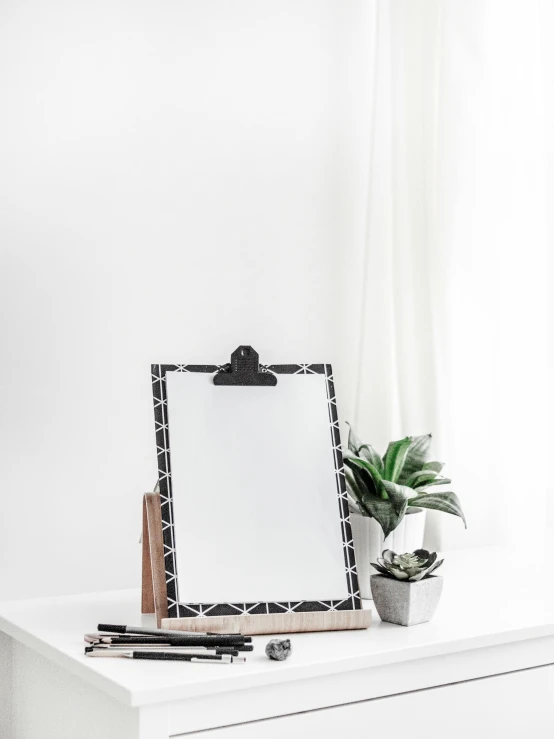 a mirror sitting on top of a white dresser, a picture, holding a clipboard, black ink on white background, 2019 trending photo, square lines