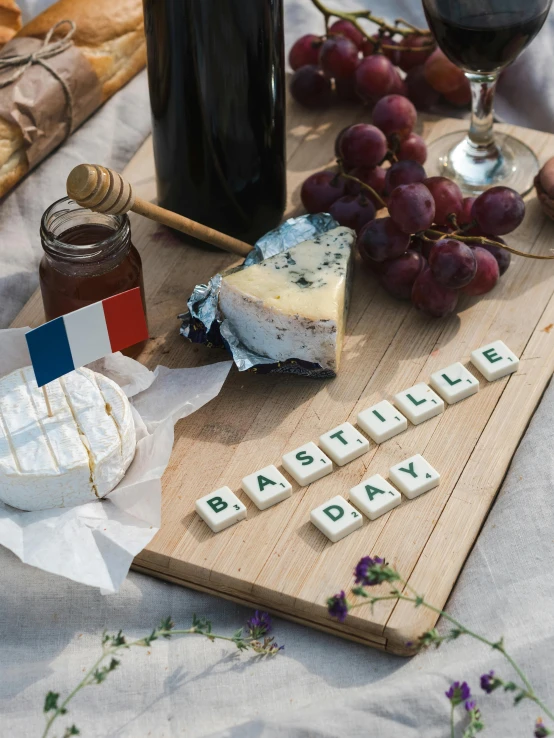 a bottle of wine sitting on top of a wooden cutting board, inspired by Jules Bastien-Lepage, letterism, reflective chessboard, french flag, made of all white ceramic tiles, breakfast