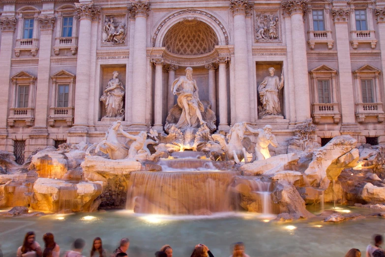a group of people standing in front of a fountain, pexels contest winner, neoclassicism, avatar image, michael angelo, evening, maurizio cattelan