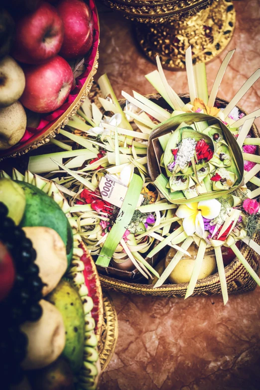 a table topped with lots of different types of fruit, in a temple, teaser, square, celebration