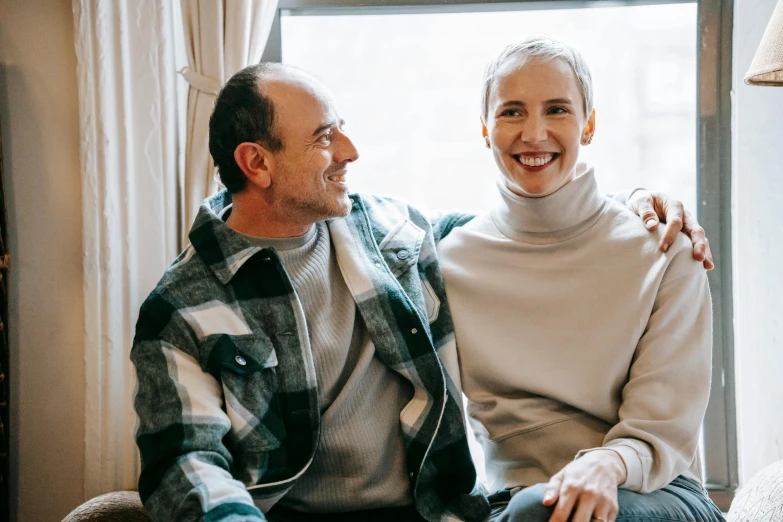 a man and a woman sitting next to each other, pexels contest winner, smiling warmly, mid - 3 0 s aged, avatar image, comfortable