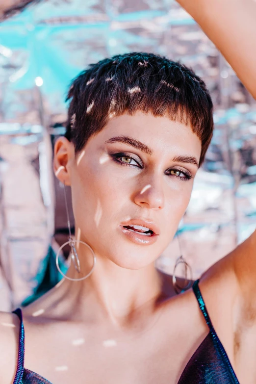 a woman in a bikini posing for a picture, an album cover, by Julia Pishtar, trending on pexels, renaissance, pixie cut, headshot portrait, brazilan supermodel, christina kritkou