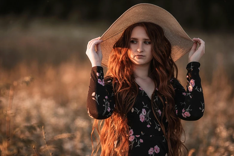 a woman with long red hair wearing a hat, pexels contest winner, teen girl, softly lit, outdoor photo, modeled