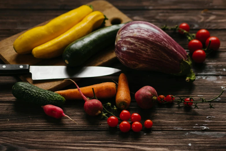 a cutting board with vegetables and a knife on it, a still life, pexels contest winner, avatar image, background image, multicoloured, full-body